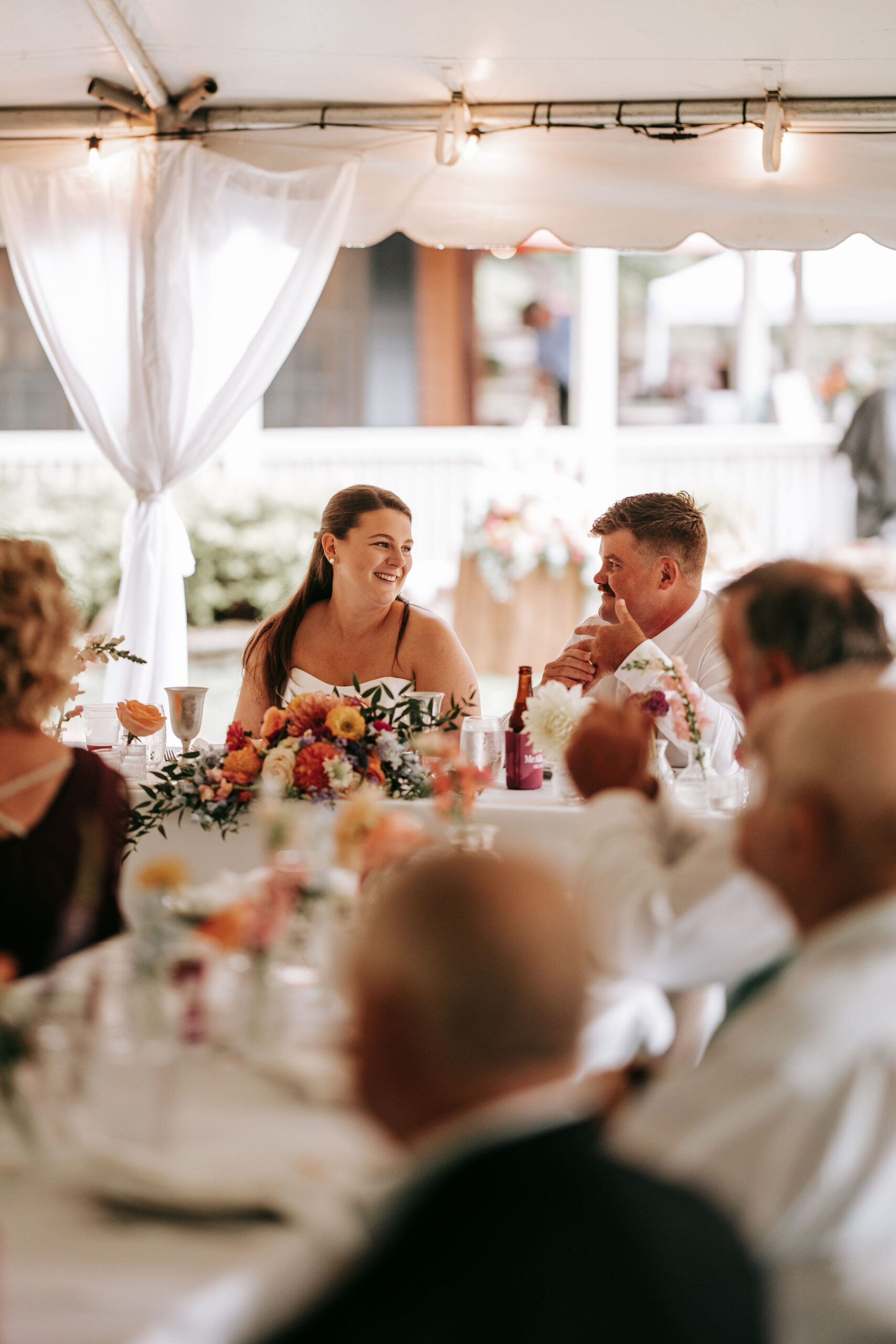 Bride and Groom Sharing a Moment at Wedding Reception