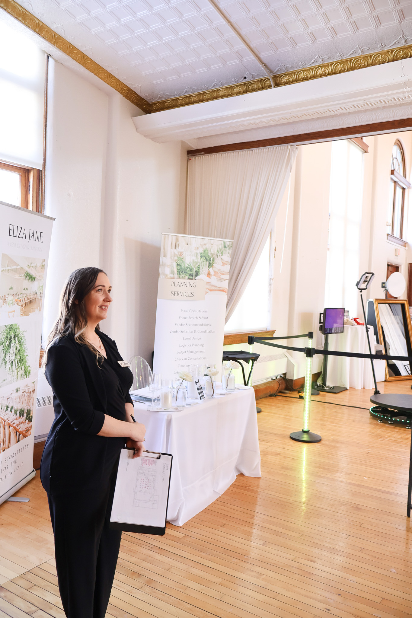 Headshot of Jolene B., Venue Director at The Wells Estate, smiling in a professional portrait against a neutral background.