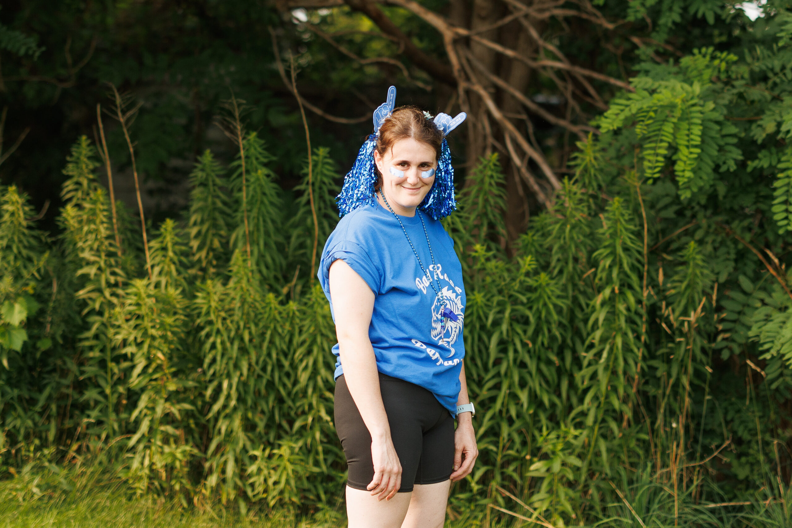 Barracudas Team at the Partyman Funner Olympics Partyman team member representing the blue Barracudas in team gear during the annual outdoor Funner Olympics.